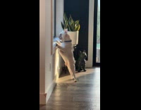 Woman calling dog skinny jeans 