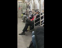 Guy eats food using his hand subway 