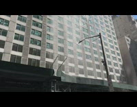 Water coming out of a window side of tall building