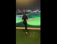 Woman makes funny video at Top Golf