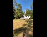 Submitter shows barrel launch from controlled explosion