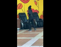 Man tiktok dance front of massage chair