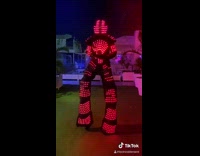 Light up suit person does body dance 