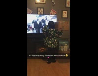 Boy holds cardboard box copies funeral meme 