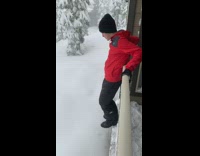Guy jumps into deep snow 