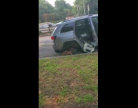 Woman show car with fairings and tires removed