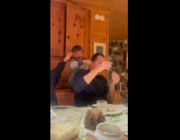 Kids touches ear of father to irritate him