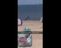 Girl blue mermaid tail beach sand 