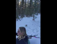 Woman unicorn floaty sled snow hit tree