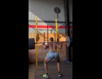 Man lifts barbell then rips his shorts