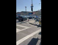 Guy drives by visits foil cardboard condo