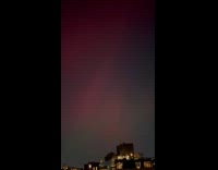 Collab WINY - Woman reacts films northern lights from williamsburg 