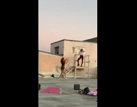 Girl red leggings stairs rooftop sound bath