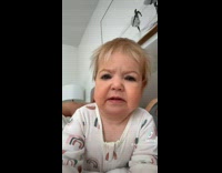 Little baby in white shirt old person face filter 