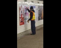 Worker clean pink graffiti 