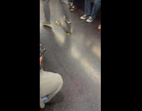 Broken raw egg on subway floor 