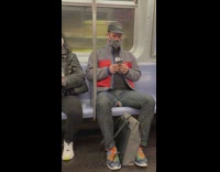 Man riding the subway in assless chaps