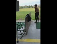 Guy breaks golf club while swinging