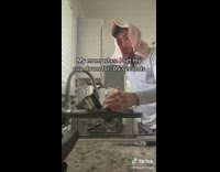 Man Puts Down Glass then Washes It