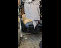 Toddler kid sleeps inside the bottom basket of stroller when the seat is empty