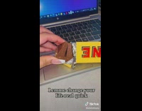 Woman shows an easier method to break off chocolate from toblerones 