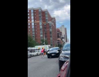 Collab WINY - Man waves Spain flag on street 