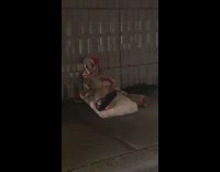 Clown scene sitting under a tunnel