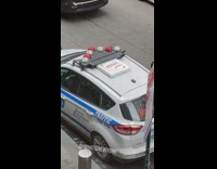 pizza box on top cop car