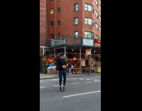 Collab WINY - Two guys play catch football on street