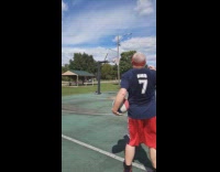 Man does trick shot using 2 basketballs 