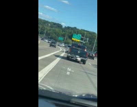 Collab WINY - 3 people behind truck at highway