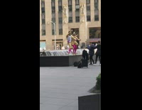 two people glitter dance fountain