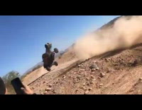 Dune buggy accidentally flips over in desert trail 
