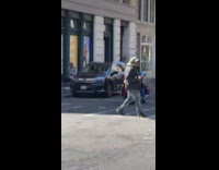 Guy riding motorcycle plays walk a thousand miles and rides off