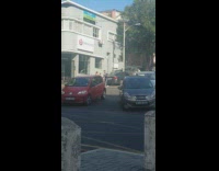 Couple practice boxing moves on street