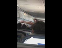 Flight attendant leads stretch