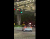 Woman twerks on driving car