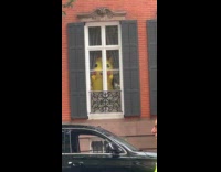 Pikachu sneaks a peek during street shoot