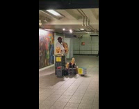 Man playing saxophone with dancing toys