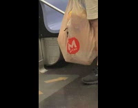 Donald trump pinata in brown plastic bag