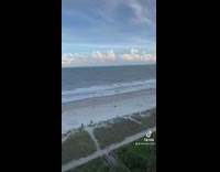 Lady sees people drawing penis in sand