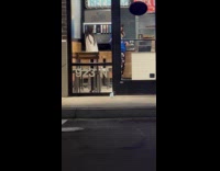 Two women tiktok dance inside Jersey Mikes