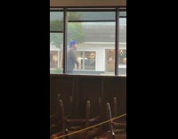 Guy blue cap dance tiktok outside starbucks