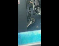 man red flannel passed out bus