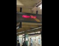 Screen in subway shows time and date