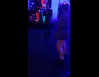 Guy dances to Funkytown song at party 