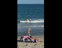 Woman orange one piece bikini back pictorial Part 1