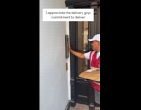 Delivery man press all buttons on wall