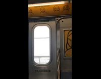 Guy wears black face mask under nose 