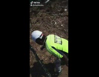 Guy gets hit in head with hard hat